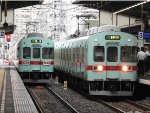 Passing each other at the station